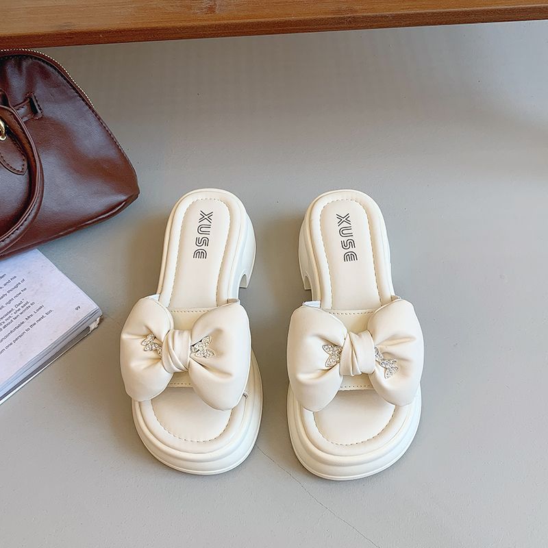 Versatile non-slip beach cool slippers 2025 new summer wear muffin thick-bottomed fairy women's height-increasing slippers