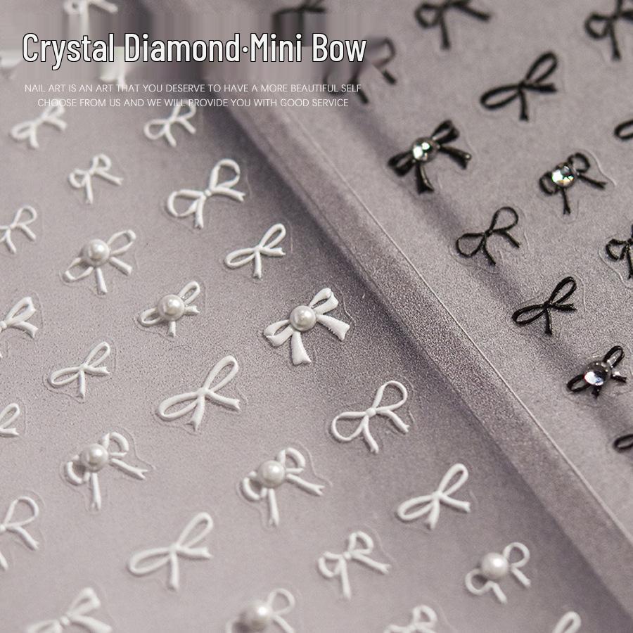 

Tomoni Minimalist Black & White Pearl Bow Nail Decals