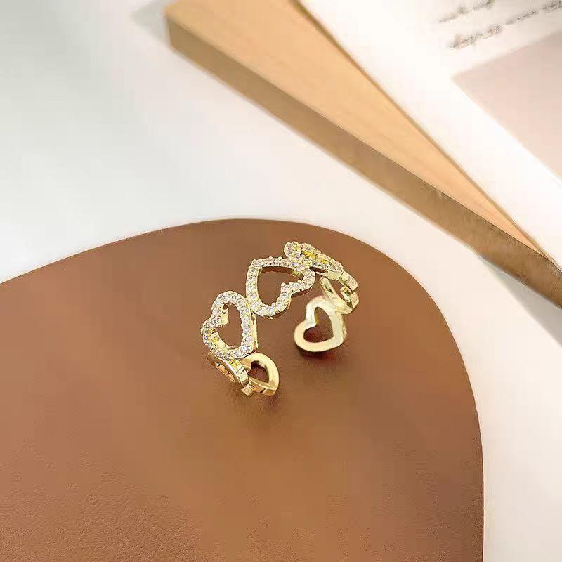 Korean version hollow love ring ins tide personality diamond ring simple Internet celebrity jewelry copper