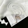 Elegant Adjustable Pearl Necklace - Versatile Light Luxury Jewelry for Women, Perfect for Autumn and Winter Sweaters.