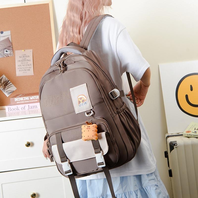 School bag, simple, lightweight and large-capacity backpack for junior high school students, new high-value, fresh and sweet backpack.