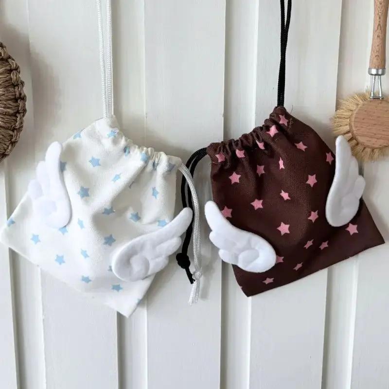 HOT Canvas Angel Wings Stars Makeup Bag INS Drawstring Storage Bag Portable Bundle Pocket Dustproof Storage Bag Organizer Bag