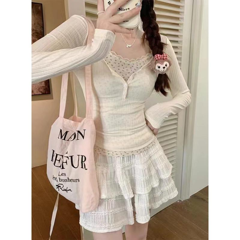 

Кружевные цветочные сращивания поддельные два леггинса женские ранняя весна новый обтягивающий короткий стиль чистый длинный рукав маленький топ One size