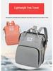 Portable Folding Mummy Bag: Lightweight, Large-Capacity Mother & Baby Backpack with Multi-purpose Bed Feature.