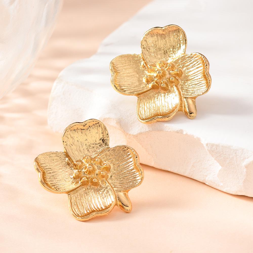 Retro French Petal Stud Earrings: Titanium Steel Flower Design with European & American Flair