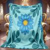 A 2D Flannel Blanket with a Fresh Blue Floral and Green Leaf Pattern, Featuring Soft High-definition Digital Printing for Cooling Comfort, Suitable Fo