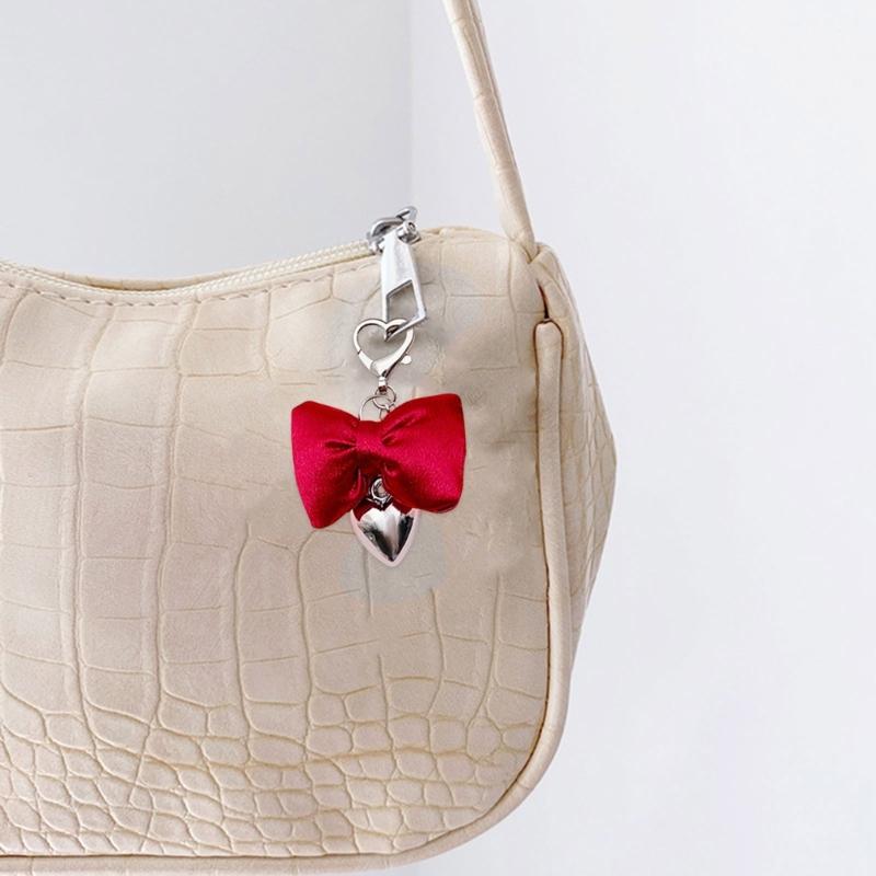Eleganter Schleifen-Charm-Schlüsselanhänger Eleganter Herz- und Schleifen-Schlüsselanhänger mit Akzent-Handtaschendekoration für Frauen Mädchen