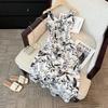 Seaside vacation style French stunning suspender ink printing V-neck summer loose lazy wind knee dress