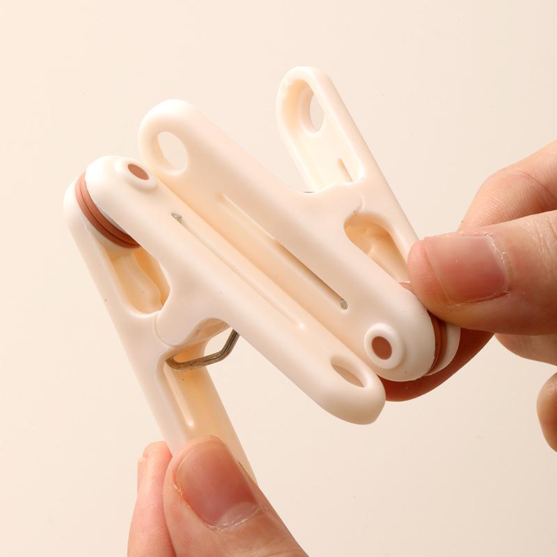 12-Piece Seamless Windproof Clothes Pegs: Durable, Sun-Proof Plastic Clips for Drying Socks and Clothes