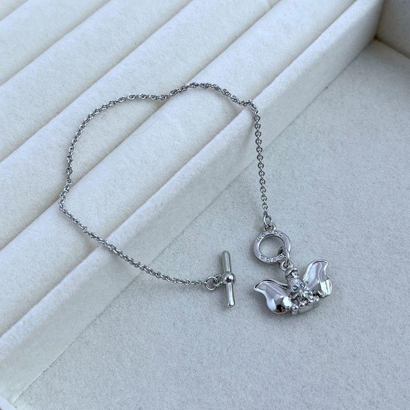 

Элегантный металлический браслет со стразами в виде слона