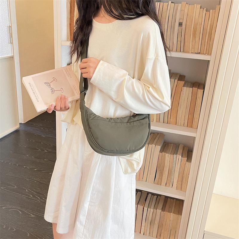 Minimalist Crossbody Bag with Adjustable Strap and Front Zip Pocket Lightweight Everyday Shoulder Bag