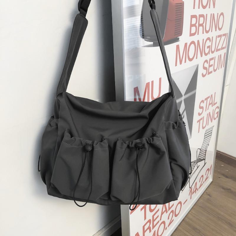 

Literary and artistic blue shoulder bag, female style, solid color, couple fashion tooling, messenger bag, trendy brand, niche mailman bag, male.