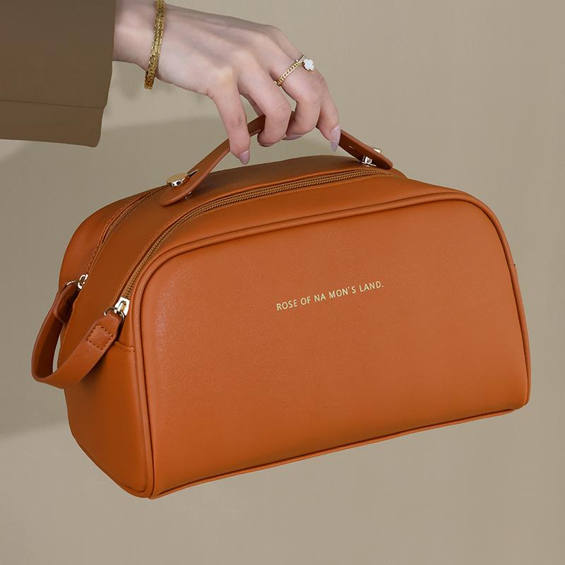 Cosmetic bag women's oversized capacity portable ins premium sense waterproof new travel makeup toilet bag storage bag
