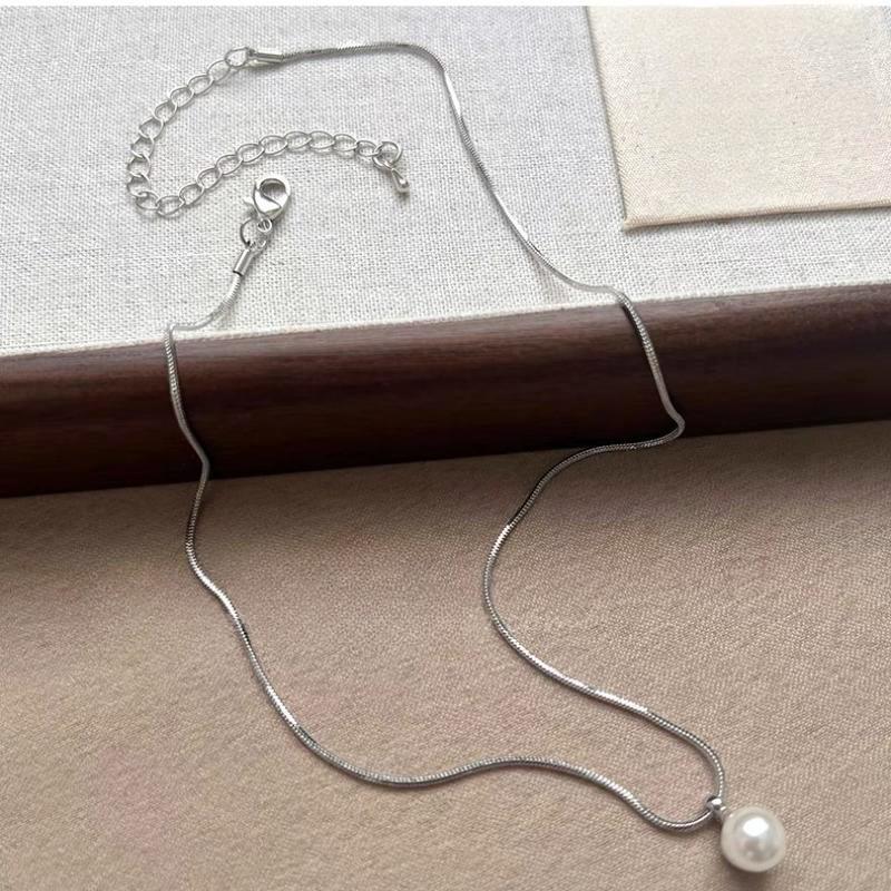 

Простое темпераментное титановое стальное жемчужное ожерелье для женщин - Роскошная цепочка для свитера 2023 года, цепочка для ключицы, чокер.