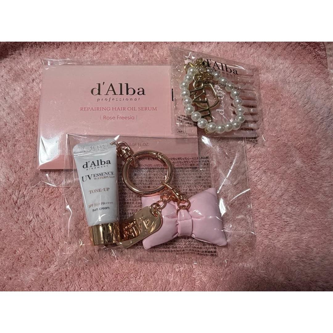 d Alba pop-up key ring mini comb hair oil