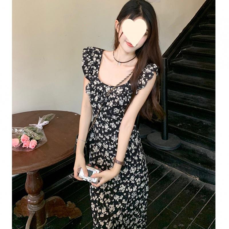 Black floral dress women's summer new skirt temperament advanced sense a word waist thin medium and long dress