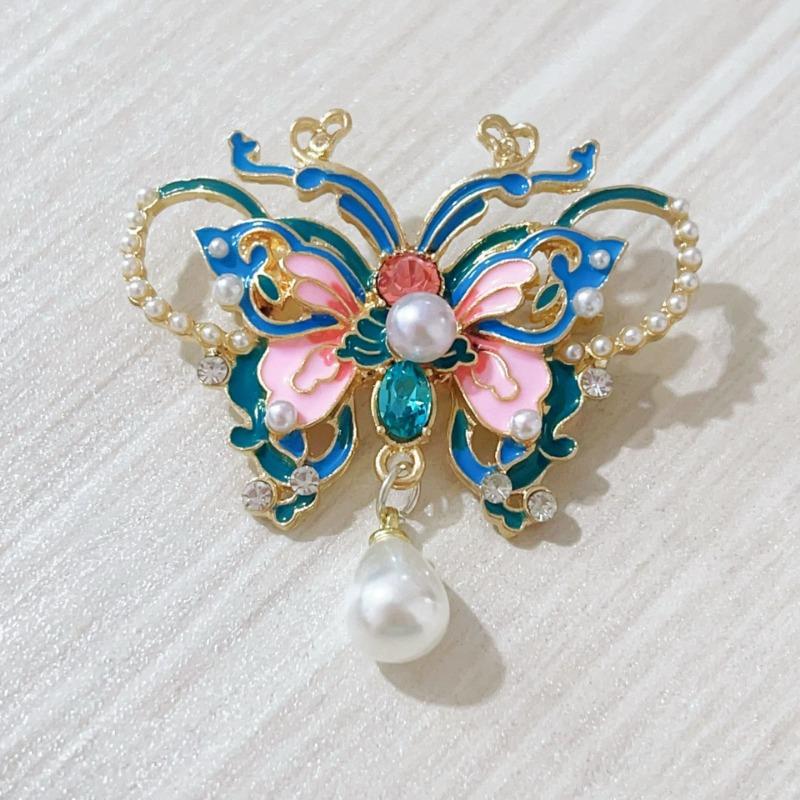 Retro enamel-colored pearl butterfly brooch - High-end, niche-style corsage fastener with anti-glare function, elegant pin.