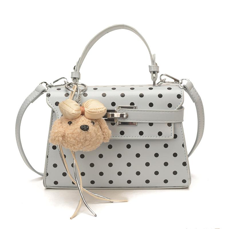 

Niche Trapezoidal Handbag Korean Polka Dot Shoulder Bag Magnetic Crossbody Bag New Stylish Versatile Commuter Small Square Bag синий