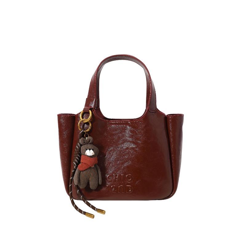 Dies ist eine trendige und modische koreanische Bucket Bag für Frauen im Sommer.. Es eine vielseitige Ein-Schulter-Tasche