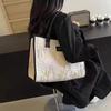 Fashion Trend Embossed Handbag 2025 College Student Versatile Large Capacity Commuting Appearance Handheld Canvas Shoulder Bag