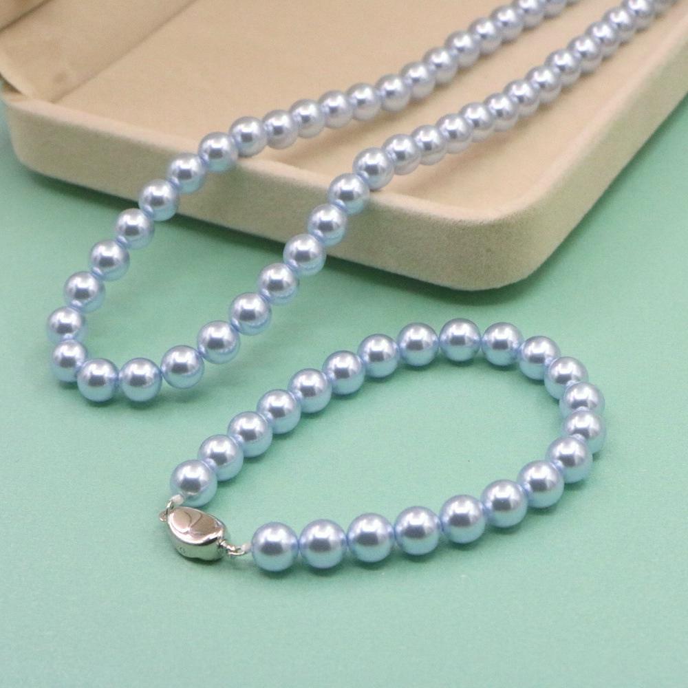 

Елегантний Набір Прикрас з Синього Перламутру: Намисто, Браслет та Сережки - Ідеальний Подарунок для Мами Sea Blue Necklace 46cm + Bracelet 19cm + Earrings