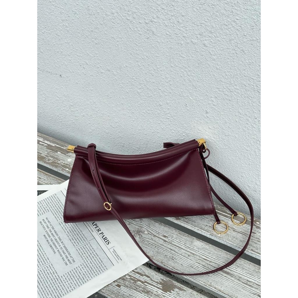 2025 neue Sommer- und Herbst-Clip-Tasche Französische Nischen-Leder-Schulter-Unterarmtasche Leder Retro-Mode Baguette-Tasche Damen