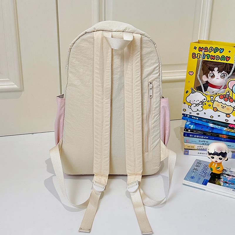 School bag: new girls' backpack, travel-friendly, lightweight, stylish versatile backpack, high-end color-block patchwork, fresh little schoolbag
