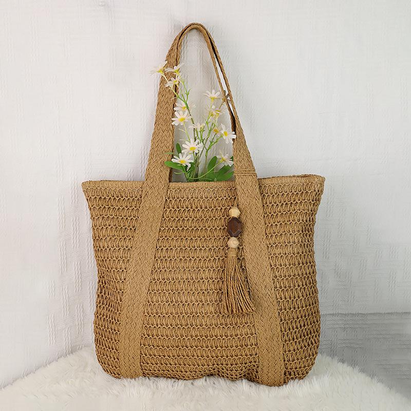 

New single shoulder solid color with fringed woven bag versatile large capacity woven straw bag vacation seaside beach women s bag хакі