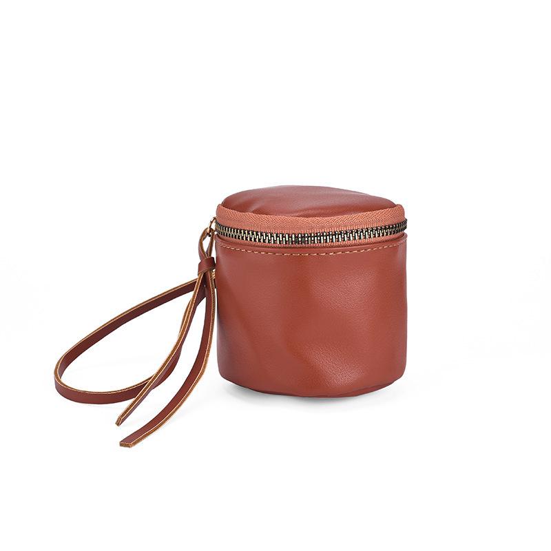 Retro Handheld Coin Purse with Wenge Beads, Flocked Leather Mini Key Holder, and Large Capacity Earphone Pocket Envelope.