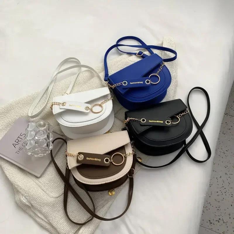 Dámské sedlové tašky crossbody tašky nové messenger tašky řetízkové klopové tašky přes rameno jednobarevná designová luxusní crossbody taška