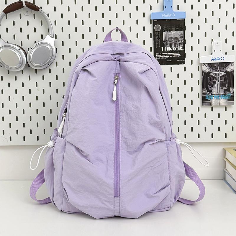 Schoolbag leisure travel backpack simple small fresh student schoolbag niche light solid color backpack spine protection burden reduction
