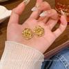 French Gold Hollow Flower Stud Earrings Women's Versatile Three-dimensional Metal Texture Earrings Cold Wind Simple New Earrings