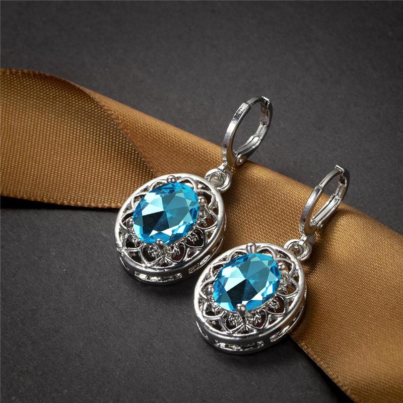 Boucles d'oreilles créoles en cristal arc-en-ciel de luxe, boucles d'oreilles de fiançailles classiques de couleur argent, boucles d'oreilles en forme de fleur ovale en zircon délicat pour femmes