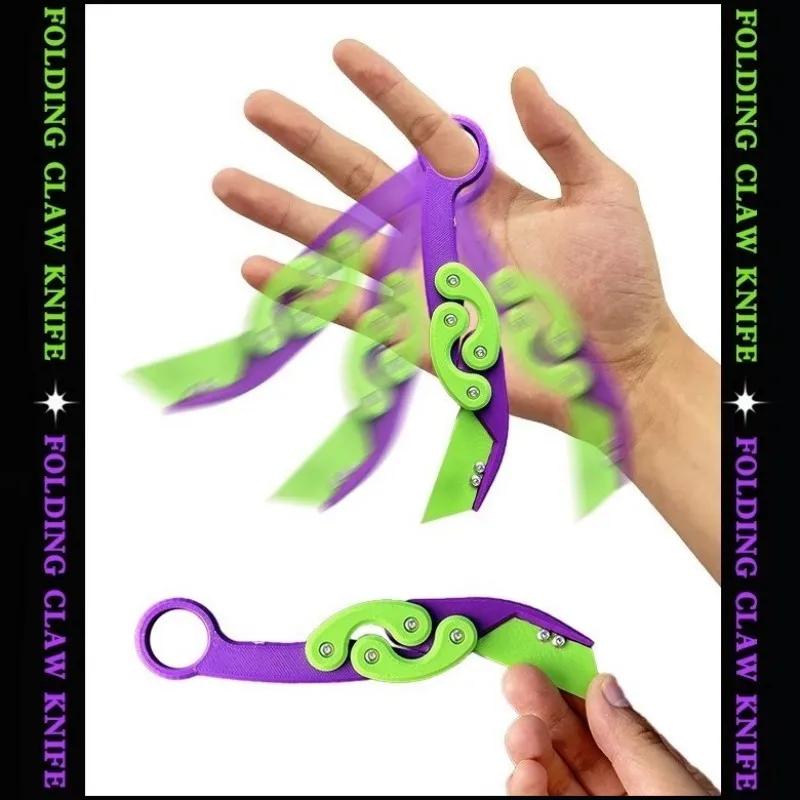 3D Explosives Schwerkraft-Klappklauenmesser Schmetterlingsklauen-Schwerkraftmesser Springen Neues Quick Push-Dekompressionsspielzeug Cooles Messer