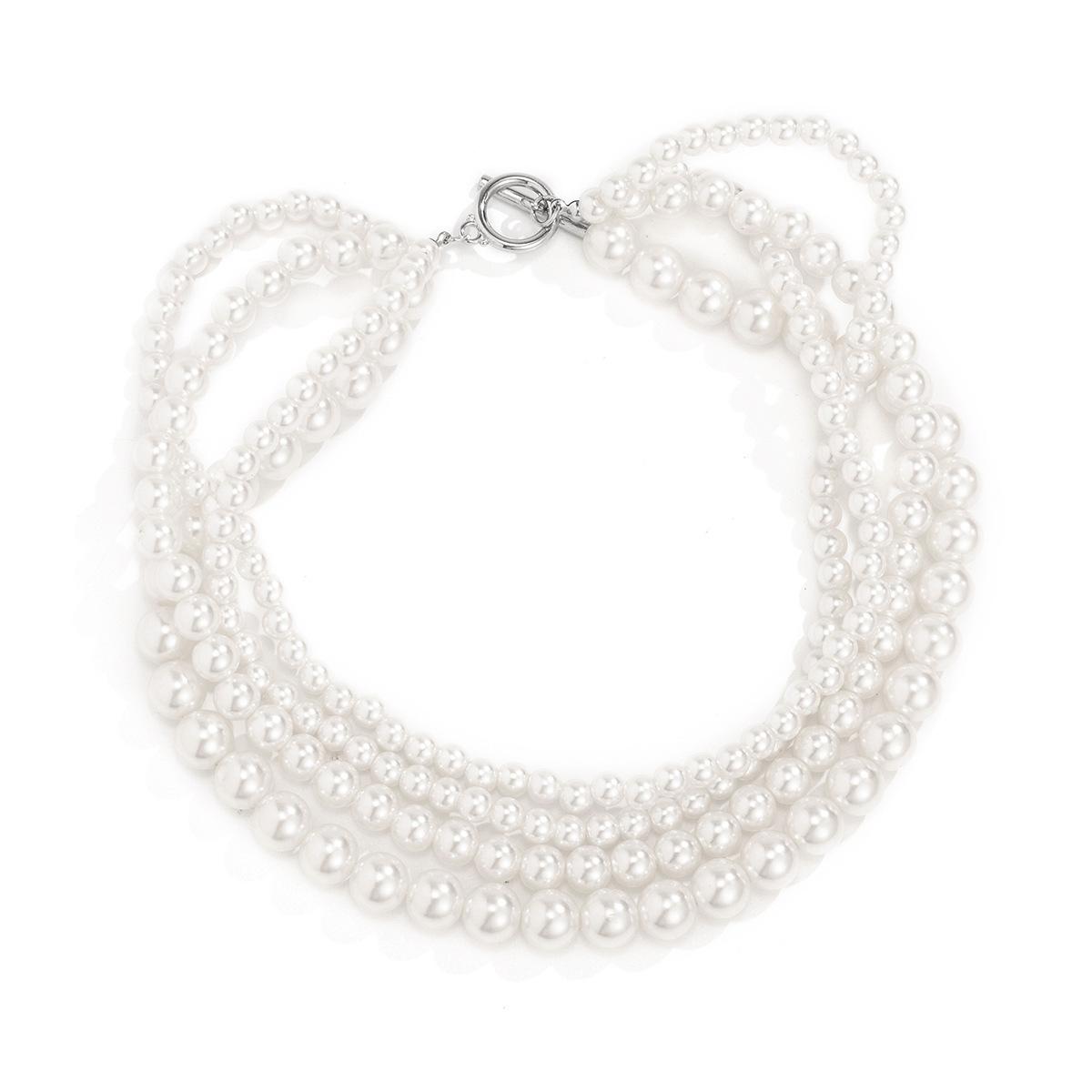 

Temperament Multi-layer retro pearl stacked collarbone neck chain Simple and cold woven beaded necklace