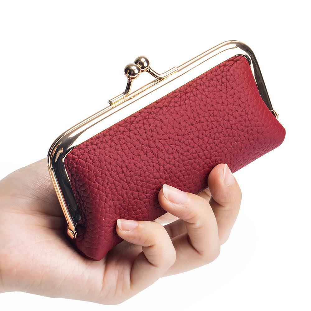 New niche change bag mini first-layer cowhide storage bag women's fashion mouth red envelope small clip bag tide
