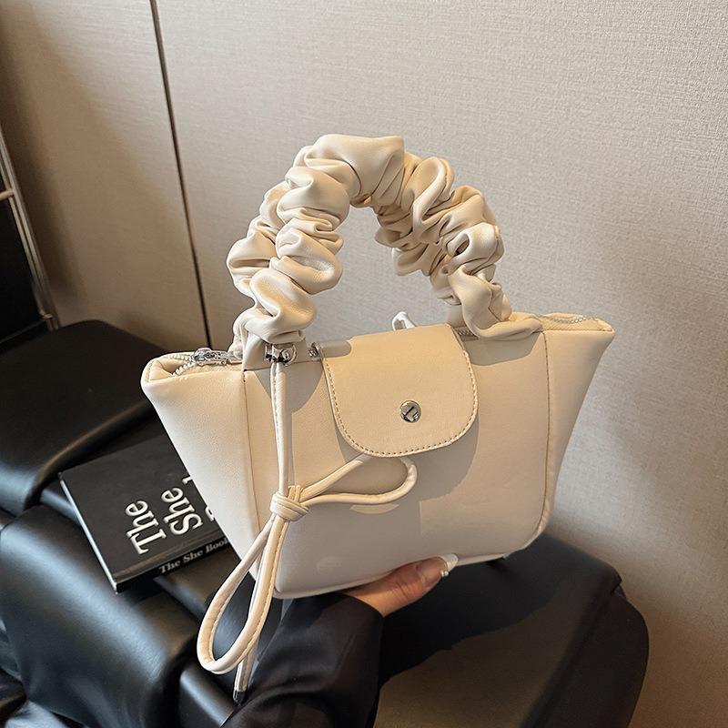 Bolsa plissada de nicho de moda, bolsa feminina nova de verão versátil de ombro/axila, bolsa pequena