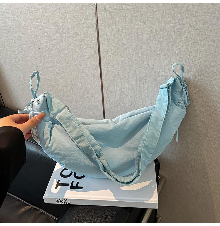 Outdoor sports wind large capacity canvas shoulder messenger bag retro tied knot handbag women's casual new dumpling bag