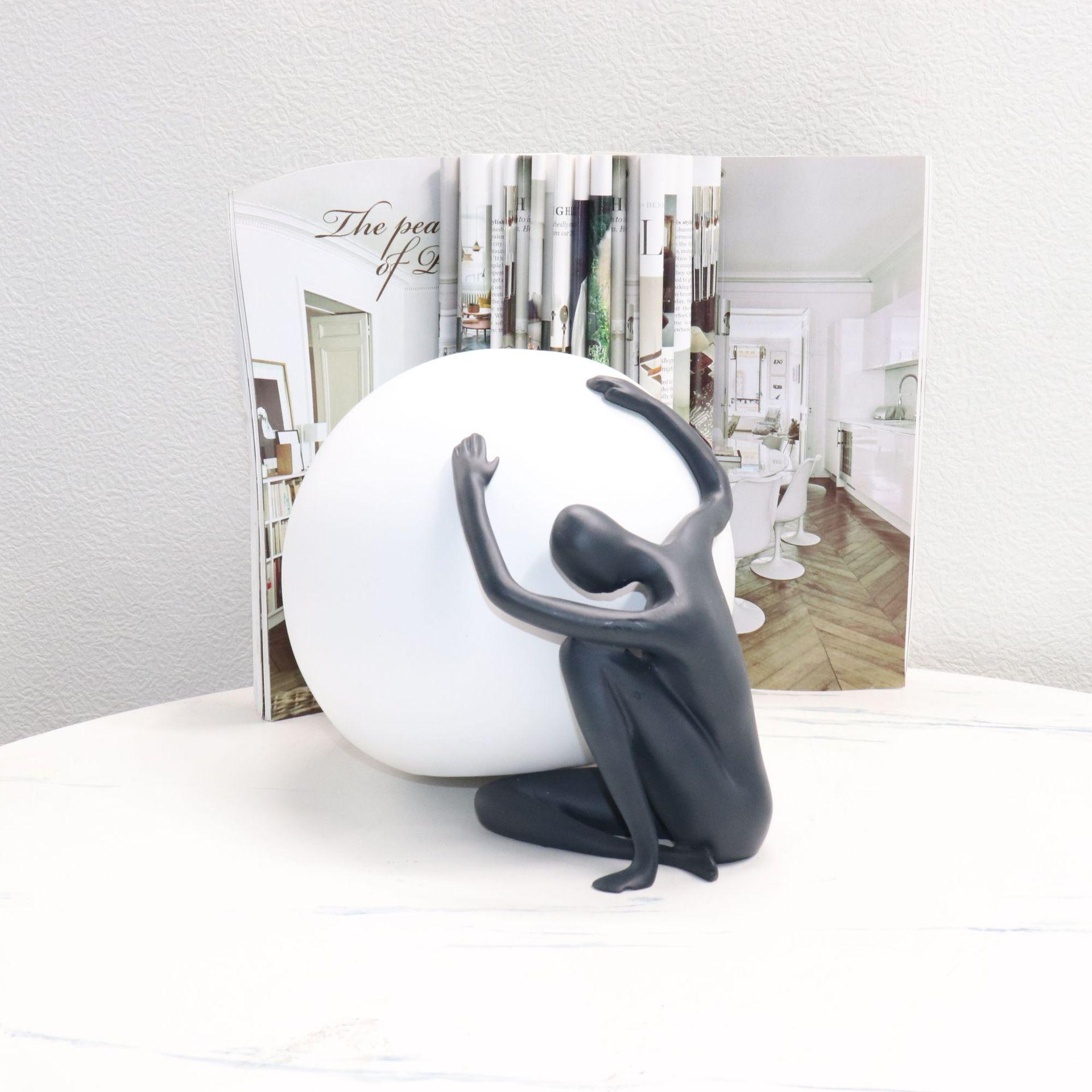 

Artistic Ball-Holding Figure Sculpture: C-Shaped Decoration for Hotel & Display Cabinets