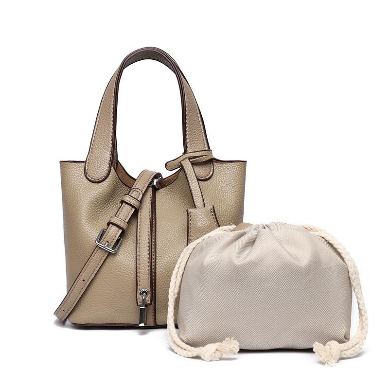 The top layer of cowhide women's bag, high-end leather bucket bag, handbag bag, commuter lychee pattern one-shoulder crossbody mom bag