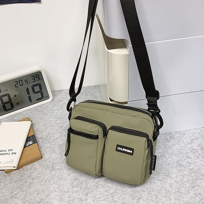 Outdoor leisure multi-pocket canvas messenger bag women's and men's simple travel nylon single shoulder small square bag