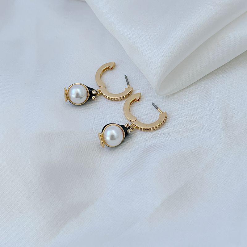 

Penguin Shape Pearl Inlaid Dangle Earrings