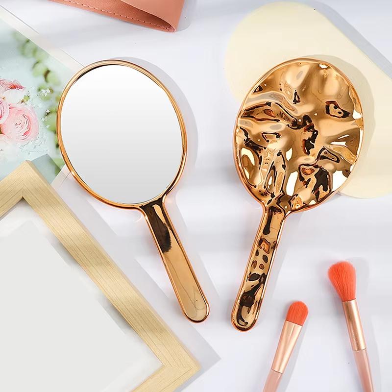 Flüssige Ellipsoidform Spiegel Handgehalten Desktop Kosmetik Make-up Spiegel Reise Tragbar Schönheit Glänzend Silber Spiegel für Handtasche