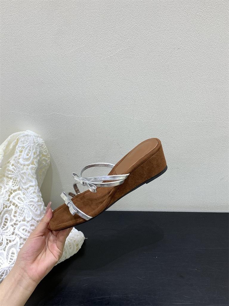 French beautiful bow thick-soled cool slippers women's fashion 2025 summer with skirt one-word wedge slippers