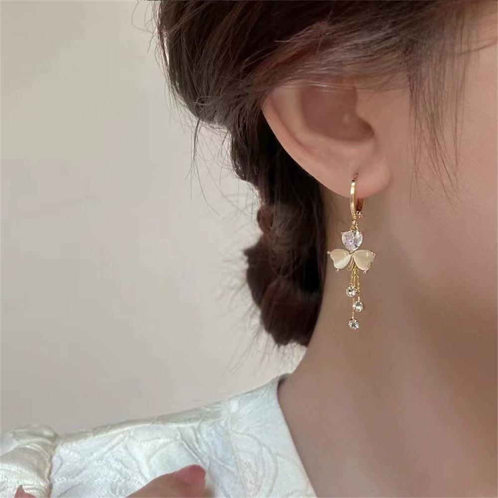 New Light Luxury Three Leaf Clover Ear Buckle with Advanced Sense Cat Eye Stone Tassel Unique Four Leaf Clover Earrings