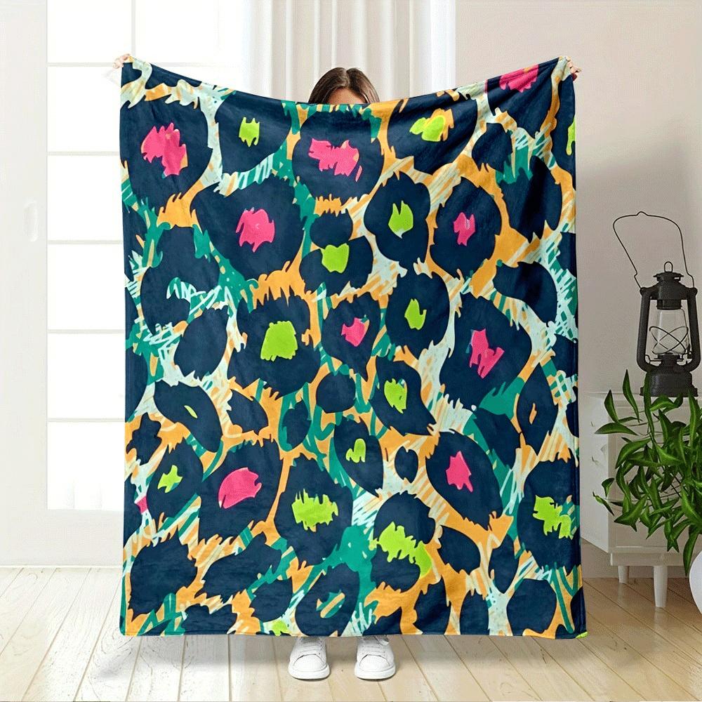 Abstract leopard print with bold dark spots and vibrant pink-green centers. for all seasons blanket lunch break throw gift