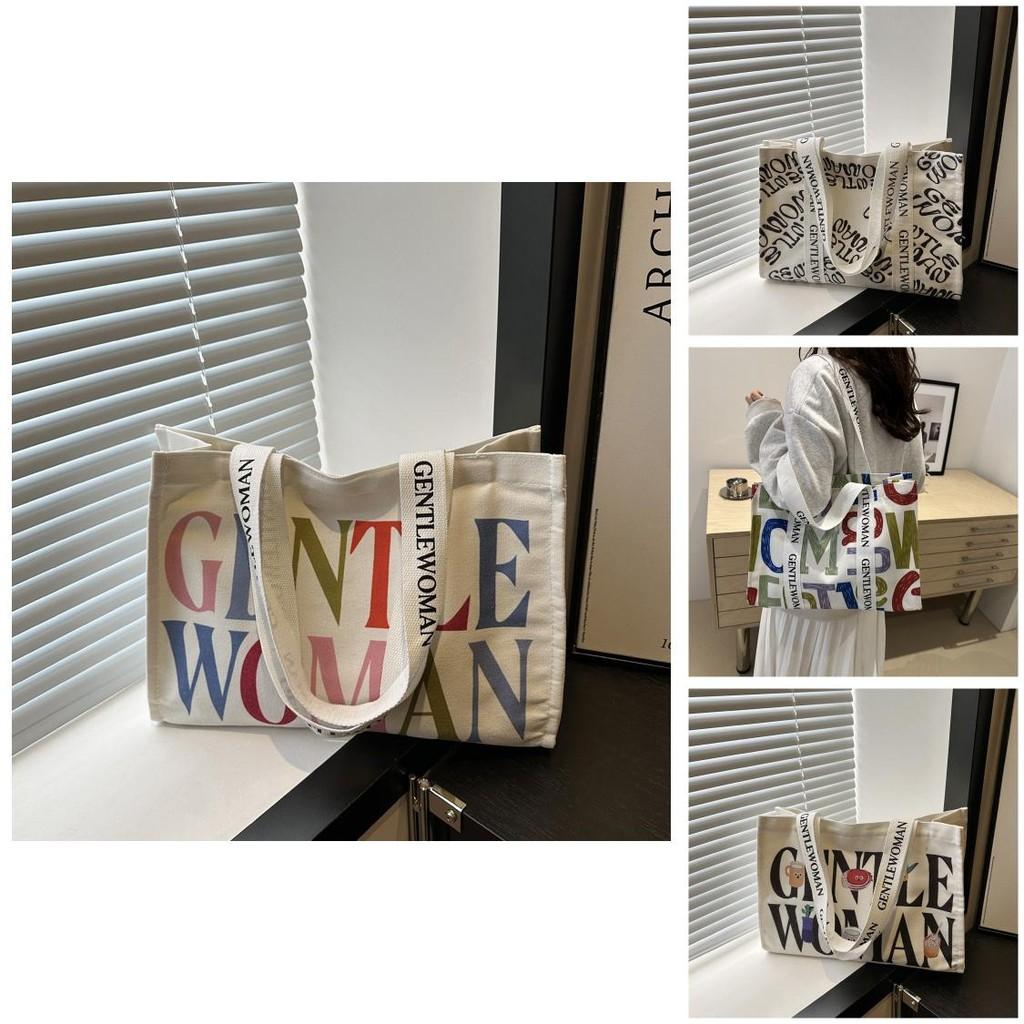 Large Capacity Stylish Canvas Tote Bag With Vibrant Letter Print Design For Everyday Use