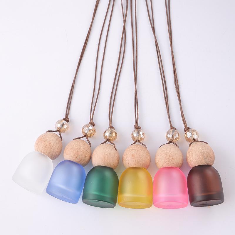 Frosted Glass Car Diffuser Bottle with Lanyard for Essential Oils - Refillable and Ideal for Home or Wardrobe Decor.