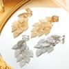 Exaggerated copper Color Leaves Long Tassel Pendant Earrings for Women Creative Metal Hollow Leaf Earrings Party Zircon Gift