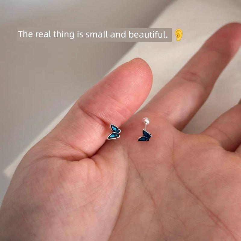 

S925 Sterling Silver Blue Butterfly Stud Earrings Women Ear Piercing Sleep Free Pick Ear Bone Stud Niche Exquisite Small Earrings Pair of blue butterfly stud earrings